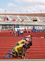 Image 28Men assuming the starting position for a sprint race (from Track and field)