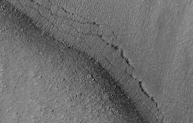 Close view of pits, as seen by HiRISE, under the HiWish program