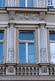 Columns, balustrade and adorned lintel