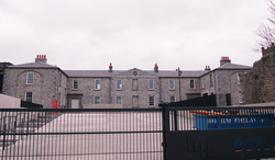 Gallery building seen through gates