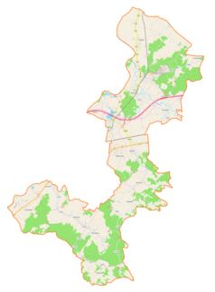 Mapa konturowa gminy wiejskiej Dębica, na dole nieco na lewo znajduje się punkt z opisem „Gumniska”