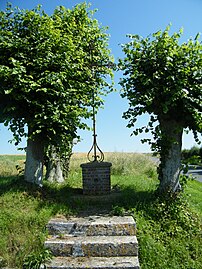 Croix de mission, en sortie de village.