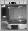 Image 6 Trojan Room coffee pot Picture: Quentin Stafford-Fraser The Trojan Room coffee pot was the inspiration for the world's first webcam. The coffee pot was located in the corridor just outside the so-called Trojan Room within the old Computer Laboratory of the University of Cambridge. The webcam was created in 1991 to help people working in other parts of the building avoid pointless trips to the coffee pot by providing, on the user's desktop computer, a live 128×128 pixel greyscale picture of the state of the coffee pot. The webcam was shut down on 22 August 2001, following the Computer Laboratory's move to the William Gates Building. More selected pictures