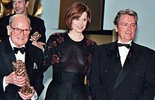 Sigourney Weaver with two other men