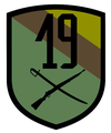 Oznaka rozpoznawcza 19. Brygady Zmechanizowanej na mundur polowy.
