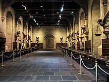 A stone set with gargoyles on the wall - the Harry Potter Hogwarts Great Hal