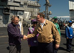 US Navy 041009-N-4565G-003 Georgia Minister of Defense, Giorgi Baramidze, greets Secretary of Defense (SECDEF), Donald H. Rumsfeld, on the flight deck aboard the conventionally powered aircraft carrier USS John F. Kennedy (CV 6.jpg