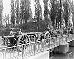 A 60 Pounder with a limber towed by a horse-team. Its barrel has been pulled back to rest on its trail for transport.