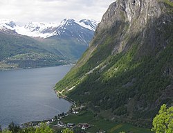 View of the village in foreground. Across the fjord is Linge (left) and Valldal (center).