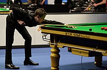 photo of David Gilbert playing a snooker shot