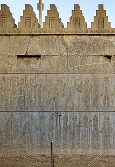 Persian Achaemenid rosette friezes on a wall, c.490 BC, limestone, in situ, Persepolis, Iran[9]