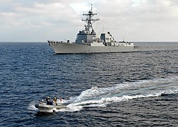 US Navy 071105-N-7981E-163 A rigid hull inflatable boat from Arleigh Burke-class guided-missile destroyer USS Momson (DDG 92) approaches USS Shoup (DDG 86) during a personnel transfer.jpg