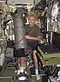 Astronaut John Phillips working on the Elektron oxygen-generation system in the Zvezda Service Module