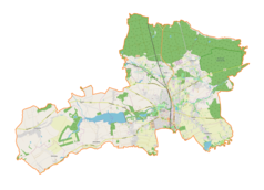 Mapa konturowa gminy Pszczyna, blisko centrum na prawo znajduje się punkt z opisem „Brama Wybrańców”