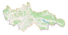 Mapa konturowa powiatu nowotarskiego, na dole nieco na lewo znajduje się punkt z opisem „Parafia Matki Bożej Częstochowskiej”