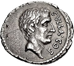 Grey coin with male head facing right