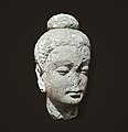 Bouddha en méditation. Hadda, Art gréco-bouddhique Ier – VIIe siècle. Stuc et schiste, H. 22 cm. Afghanistan.