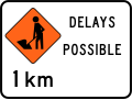 (TW-1B2.1) Road workers ahead in 1 kilometre, delays possible