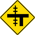 (W15-2.1/PW-13.3) Railway level crossing on uncontrolled T-junction to left