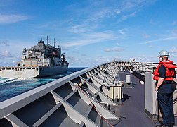 The guided missile cruiser USS Shiloh (CG 67), foreground, approaches the dry cargo and ammunition ship USNS Wally Schirra (T-AKE 8) for a replenishment at sea in the South China Sea May 27, 2013 130527-N-ZZ999-002.jpg