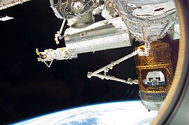 The Canadarm2 grapples the HTV in preparation for its release