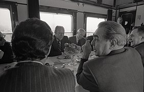 Photograph of the American Official Party and the Soviet Welcoming Committee Traveling by Train from Vozdvizhenka Airport to the Site of the Summit Meetings on Arms Control at Okeansky Sanatorium, Vladivostok, U.S.S.R. - NARA - 7158147.jpg