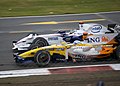 Alonso being overtaken by Heidfeld at the British GP