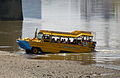 Image 34Duck tour converted DUKW amphibious vehicle exiting the River Thames.