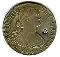 Anverso de moneda de 8 reales (plata) de Carlos IV de 1804 con resello de Tailandia.