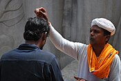 a Hindu-Priaschter, wo z’ Belur (Karnataka, Ìndià) a Mànn düat saagna, ànna 2008