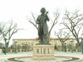 Louis Riel in front of the Manitoba Legislature