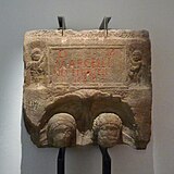 Funerary stele of a couple, with epigraphic cartridge held by two Cupids. Middle of the 3rd century. Found in Dachstein