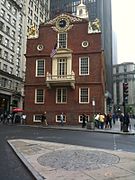 A gray brick circle now marks the site of the Massacre, in front of the Old State House