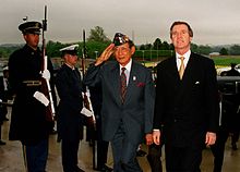 President Fidel V. Ramos salutes at the Pentagon with Secretary of Defense William Cohen and an honor guard during a State visit in 1998.