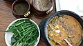 Chueo-tang (loach soup) served with garlic chives