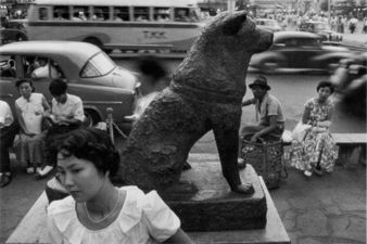 Front of the Statue of Hachikō, from The Holidays in Tōkyō - Shibuya, Tōkyō - 1954