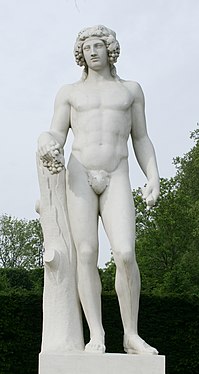 Louis-Aimé Lejeune et René Grégoire Bacchus appuyé sur un tronc d'arbre et tenant une grappe de raisin parc de Versailles