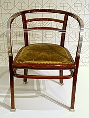 Armchair made by Gebruder Thonet (1905–1906), of beechwood, aluminum, and cane under the upholstery (Montreal Museum of Fine Arts)