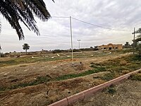 One of the modern buildings at Dur-Kurigalzu, plundered and not restored. Note the damaged outdoor park benches and umbrellas