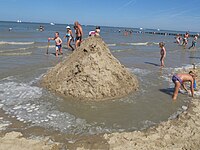 The sea moving in to surround the castle