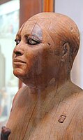 Wooden statue of the scribe Kaaper, 5th or 4th dynasty of the Old Kingdom, from Saqqara, c. 2500 BC]]