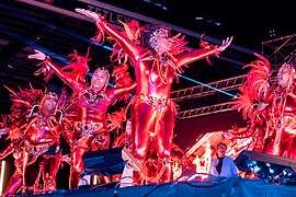 Dress rehearsal, performers in metallic red carnival costume. The Awakening. LEEDS 2023.jpg