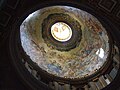 The mosaic decoration of this small dome shows the Blessed Virgin Mary in Heaven.