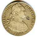 Anverso de moneda de 8 reales (plata) de Carlos IV de 1791 con resello de Sumenep (Indonesia).