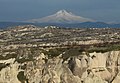 Erciyes'in zirvesi ve önde peribacaları.