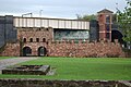 Image 3A reconstructed gateway of Mamucium fort (from History of Manchester)