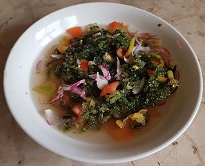 Ensaladang latô from the Philippines, prepared with vinegar, fish sauce, shallots, and tomatoes