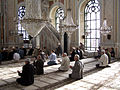 Believers during prayers in Büyük Mecidiye Camii (Ortaköy Camii)