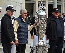 Rick Mears Al Unser and A.J. Foyt with Borg-Warner Trophy (51222961956) (cropped).jpg