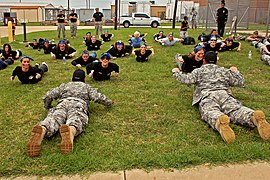 Spouses of U.S. Soldiers assigned to the 1st Squadron, 7th Cavalry Regiment, 1st Brigade Combat Team, 1st Cavalry Division, conduct physical readiness training during a spouse spur ride March 22, 2013 at Fort 130322-A-HL390-159.jpg